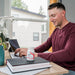 image of man sitting at desk on computer 