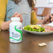 image of woman at table eating a meal 