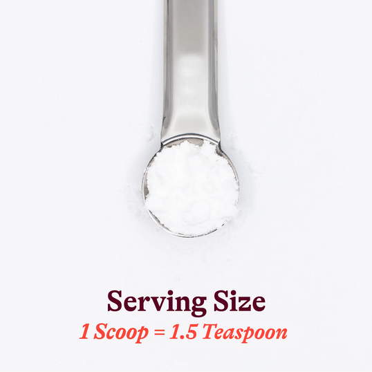 Metal scoop with text indicating serving size on a white background