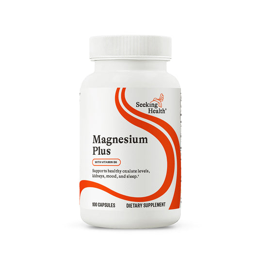 Supplement bottle labeled 'Magnesium Plus' by Seeking Health on a white background